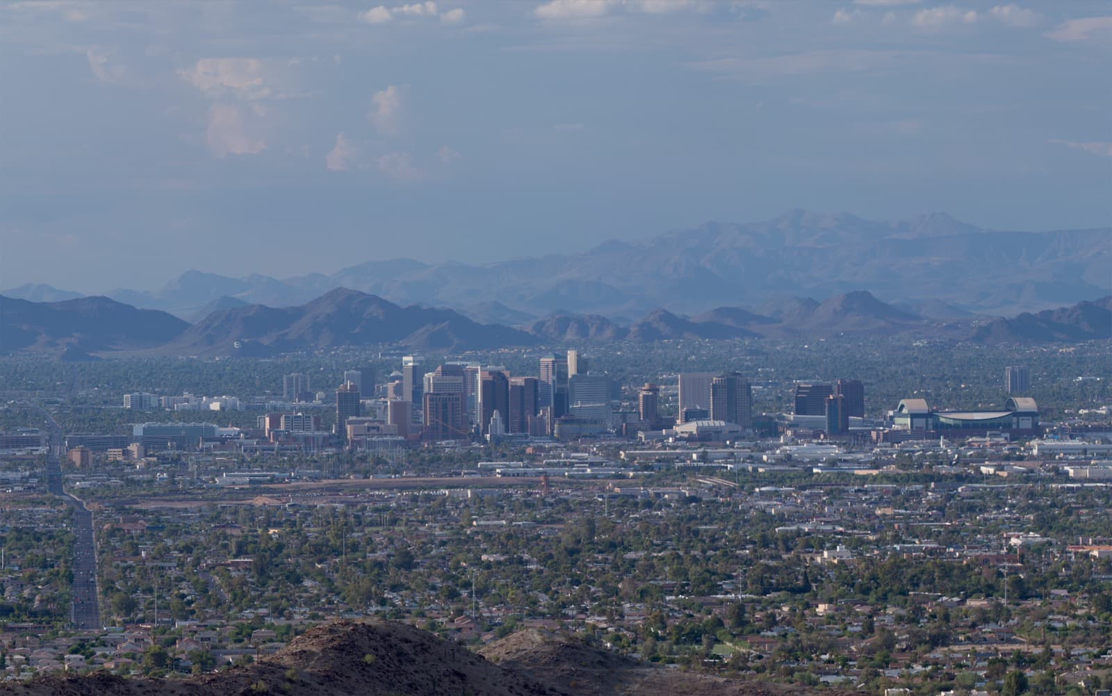 Downtown Phoenix skyline with desert mountains in the background